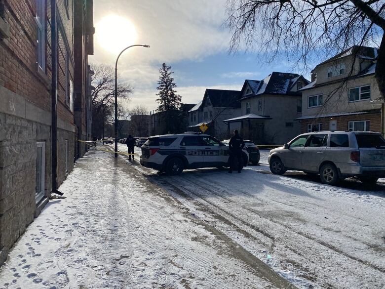 A police car is parked on a street.