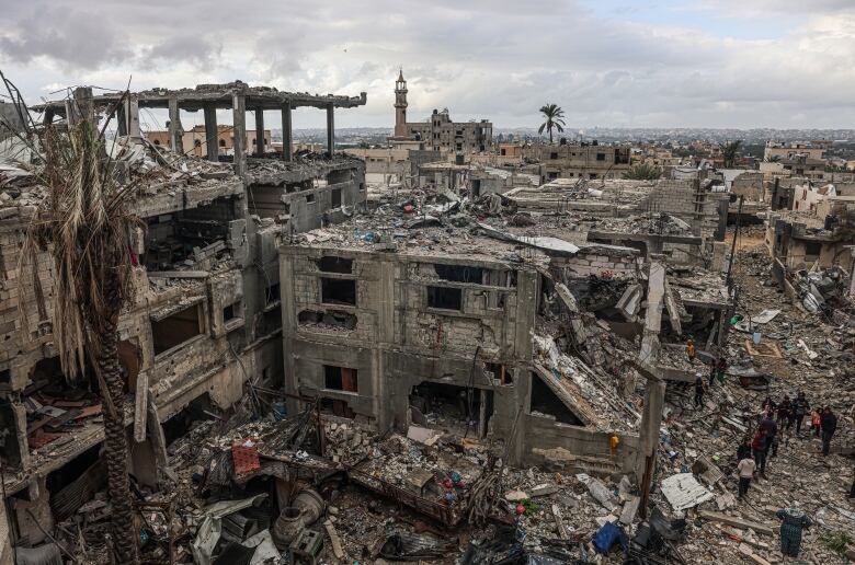 An aerial view show destroyed buildings.