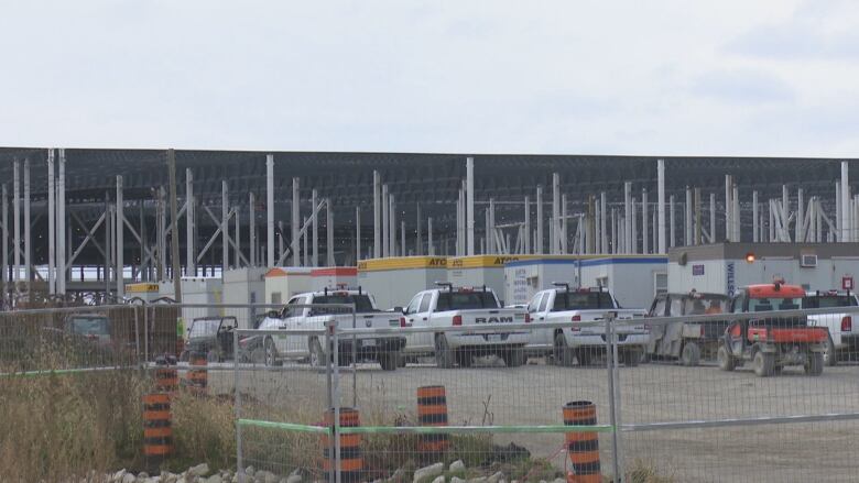 A large industrial facility under construction.