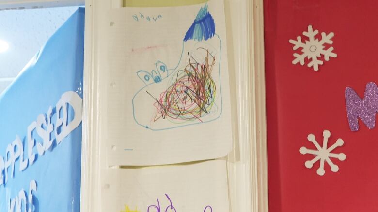 A child's drawing on the wall of Appleseed Childcare.