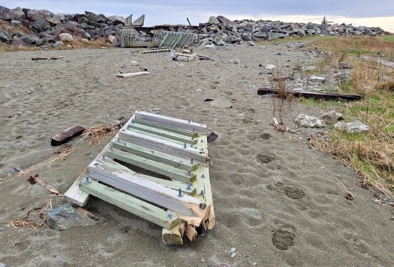 A set of stairs that leads towards the Gabarus seawall is damaged.