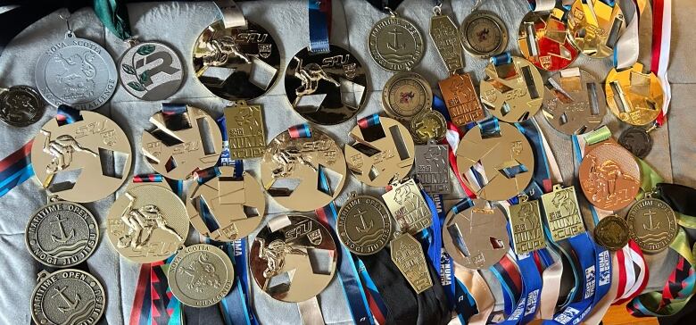 A number of sports medals on display.