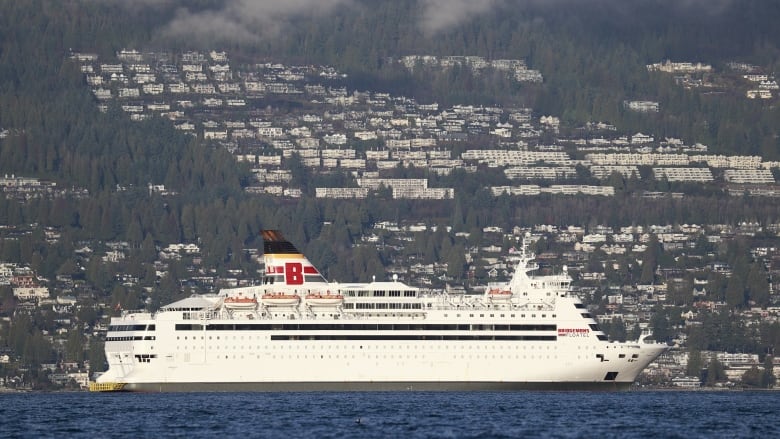 A large white ship is seen out at sea, with a large, red 'B' at the top, and to the top right, a printed name that reads 'Bridgemans Floatel'.