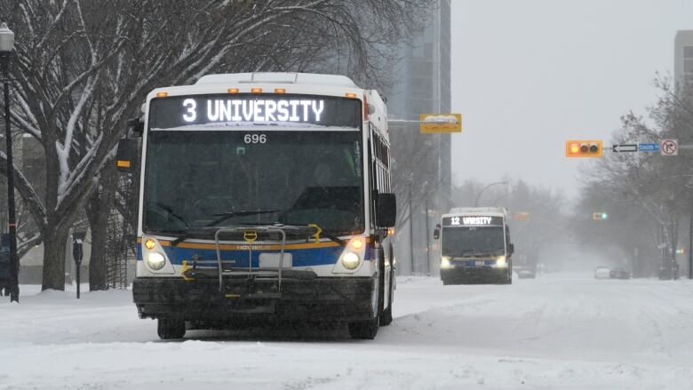 A bus stops on a snowy road in Regina