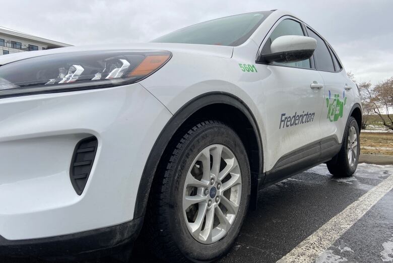 A City of Fredericton vehicle is parked in the York Street parking lot.