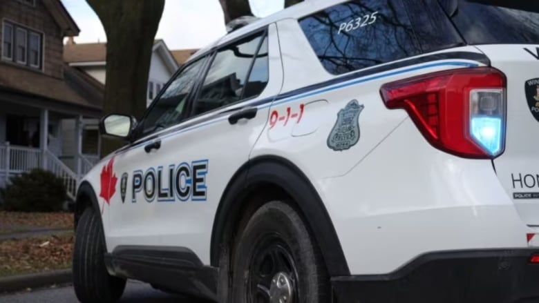 A side photo of a Windsor police car