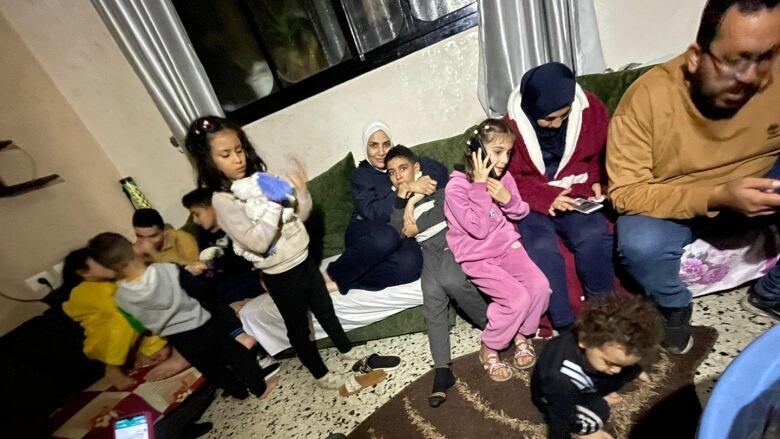 Rami Aljadba's family in an apartment in Deir Al Balah.