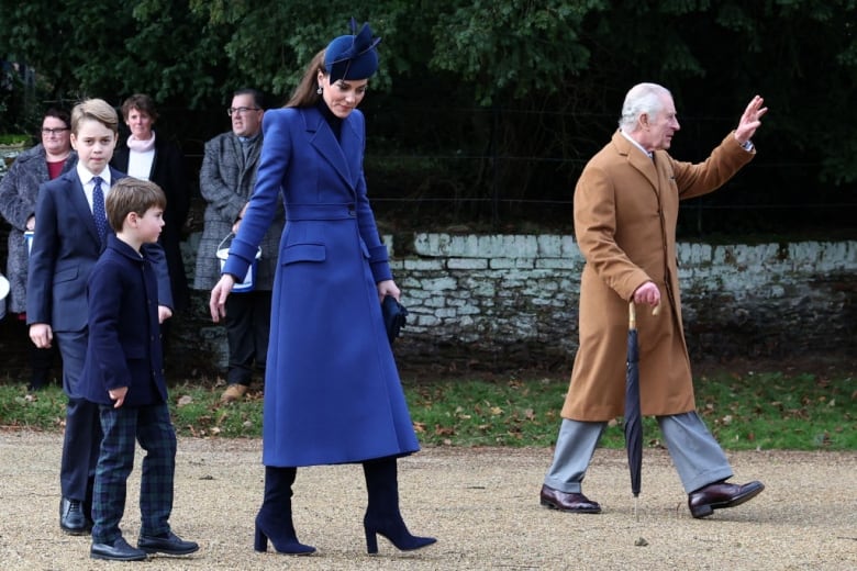 Members of the Royal Family, including Catherine, Princess of Wales, Prince George, Prince Louis and King Charles, wave to well-wishers after attending a church service.