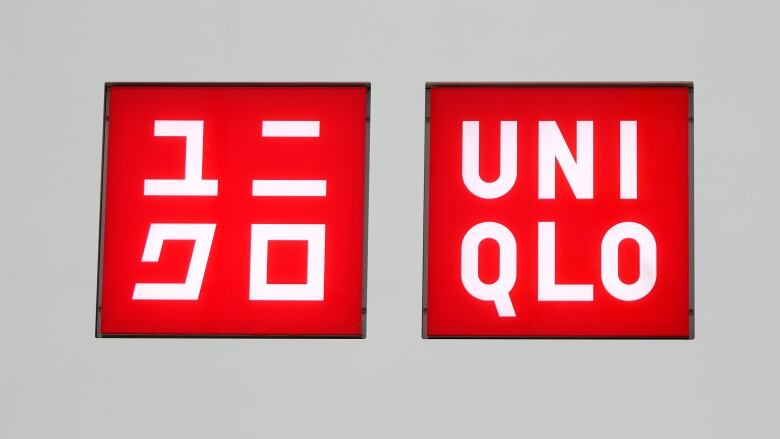 The logo of apparel giant Uniqlo is seen in Tokyo, in both Japanese and English.