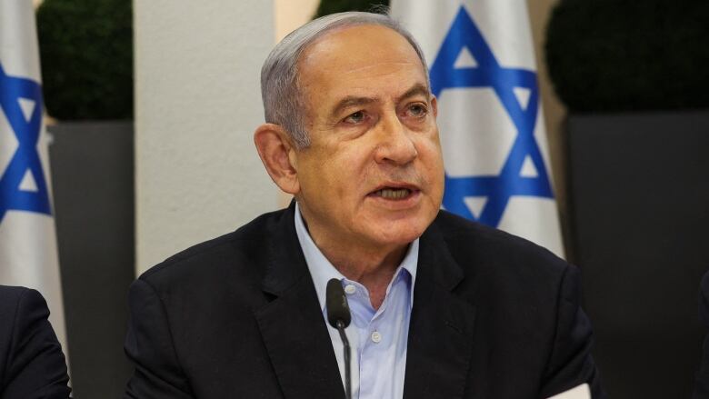 Israeli Prime Minister Benjamin Netanyahu speaks during a cabinet meeting in Tel Aviv, Isarel.