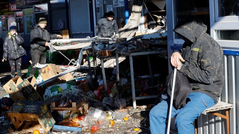 A food market is left damaged by a reported Ukrainian military strike.