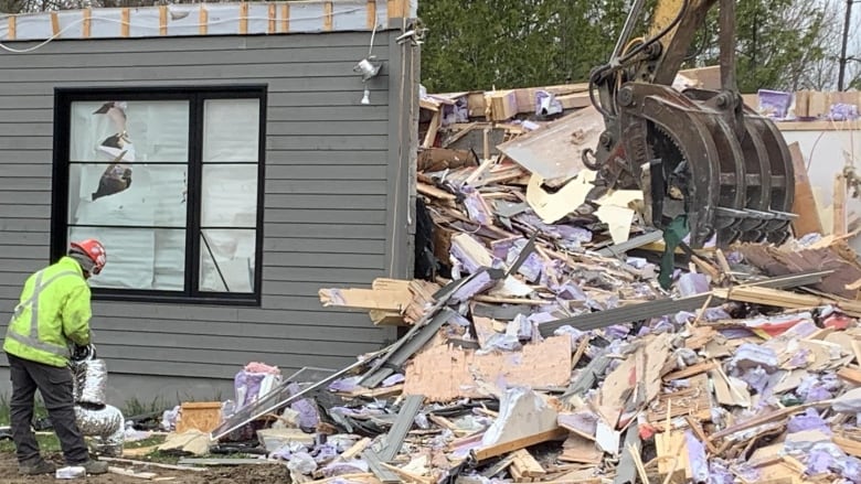 A house being demolished. 