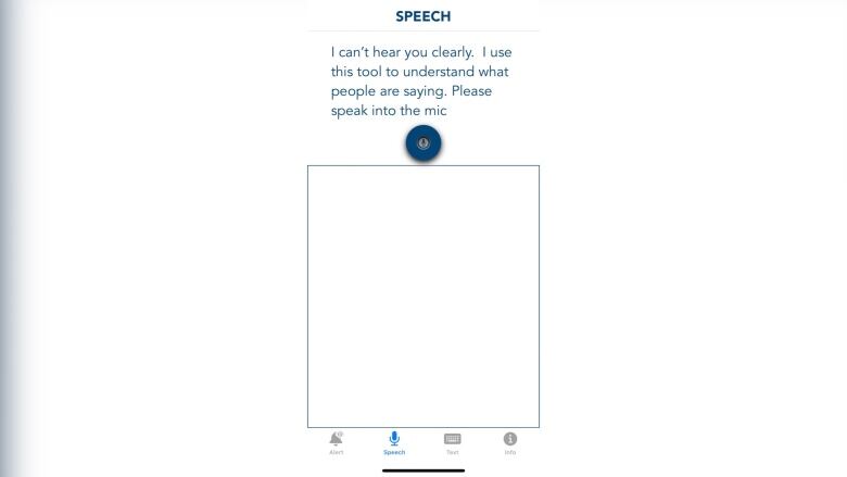 A screen shows a microphone and text above that reads, 'I can't hear you clearly. I use this tool to understand what people are saying. Please speak into the mic.'  