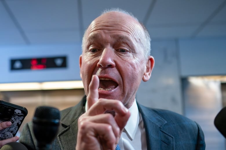 Boeing CEO Dave Calhoun speaks briefly with reporters after a meeting in the office of Sen. Mark Warner, D-Va., at the Capitol in Washington, Wednesday, Jan. 24, 2024. Part of the Boeing 737 MAX 9 fleet was grounded following a mid-air cabin panel blowout on an Alaska Airlines flight. (AP Photo/J. Scott Applewhite)