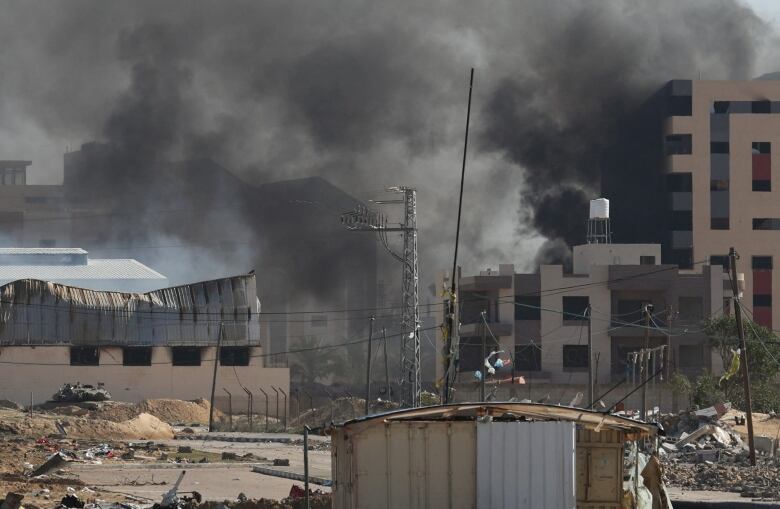 An Israeli tank is seen operating in the area of Khan Younis, in the Gaza Strip.