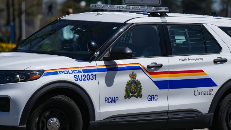 A police vehicle marked 'RCMP GRC' parked on a street.