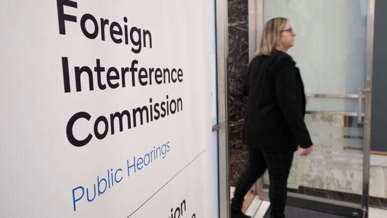 A person is seen at the Public Inquiry Into Foreign Interference in Federal Electoral Processes and Democratic Institutions as it begins hearings, Monday, January 29, 2024 in Ottawa.