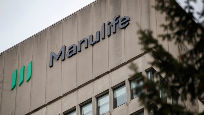 The Manulife logo is affixed to an office building.