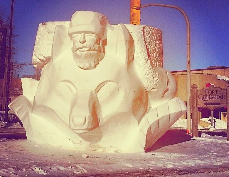 A snow sculpture of a fox head