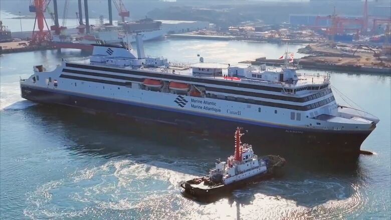 A large ferry floats on the water.