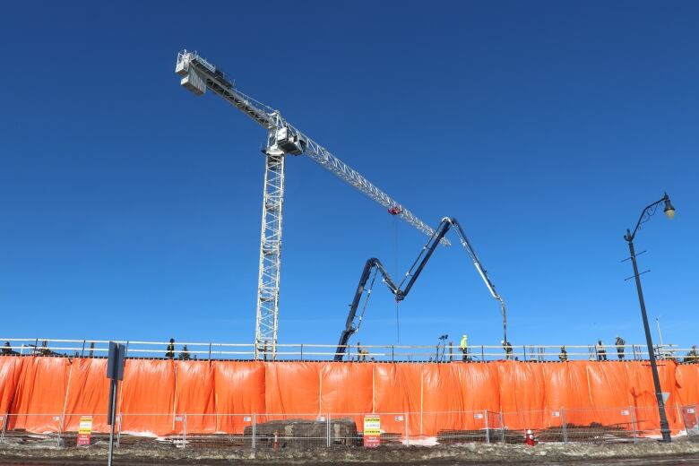 apartment construction with crane