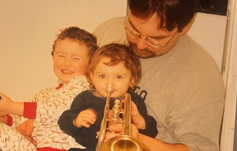 Brent Ghighlione with his children Dominic and Kiera.