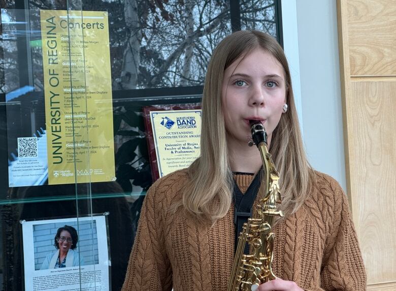 Grade 8 student Alex Benesh plays alto saxophone for the University of Regina Junior Wind Ensemble. 