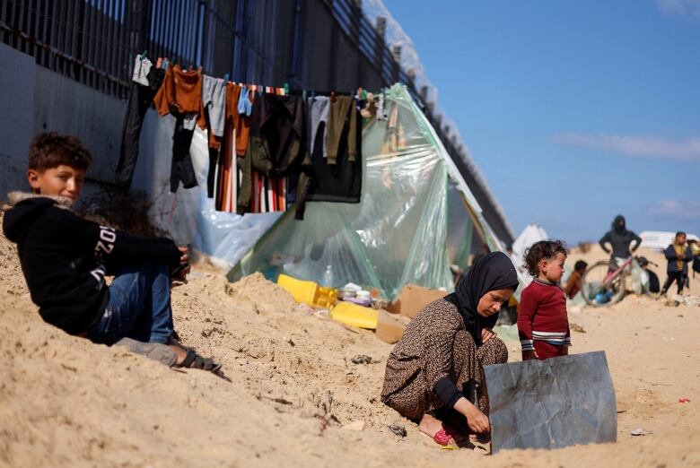 Palestinians in Gaza gather near the border with Egypt.