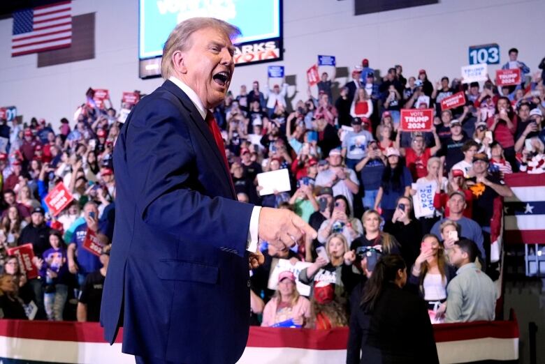 Republican presidential candidate former President Donald Trump walks off the stage after speaking at a Get Out The Vote rally at Coastal Carolina University in Conway, S.C., Saturday, Feb. 10, 2024.