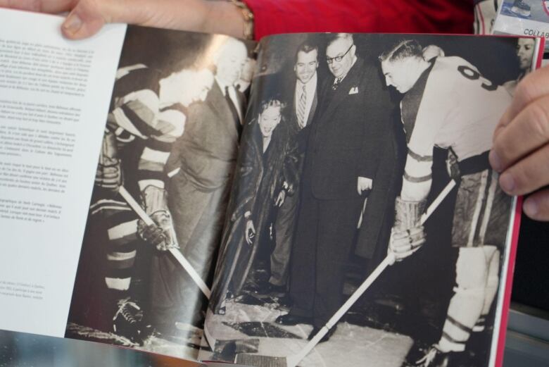 A black and white image of Jean Bliveau  at a hockey game