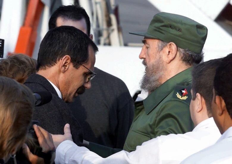 Jos Imperatori is seen being greeted by Cuban leader Fidel Castro at Havana's Jose Marti international airport on March 2, 2000.