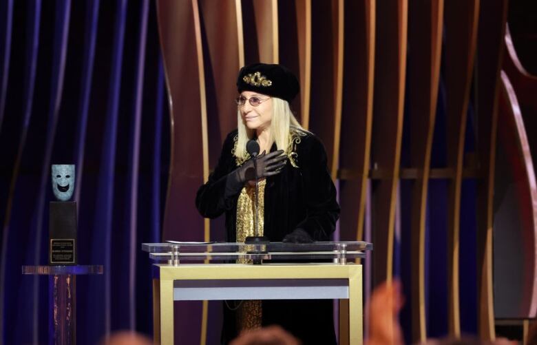 Barbra Streisand accepts the SAG lifetime achievement award onstage.