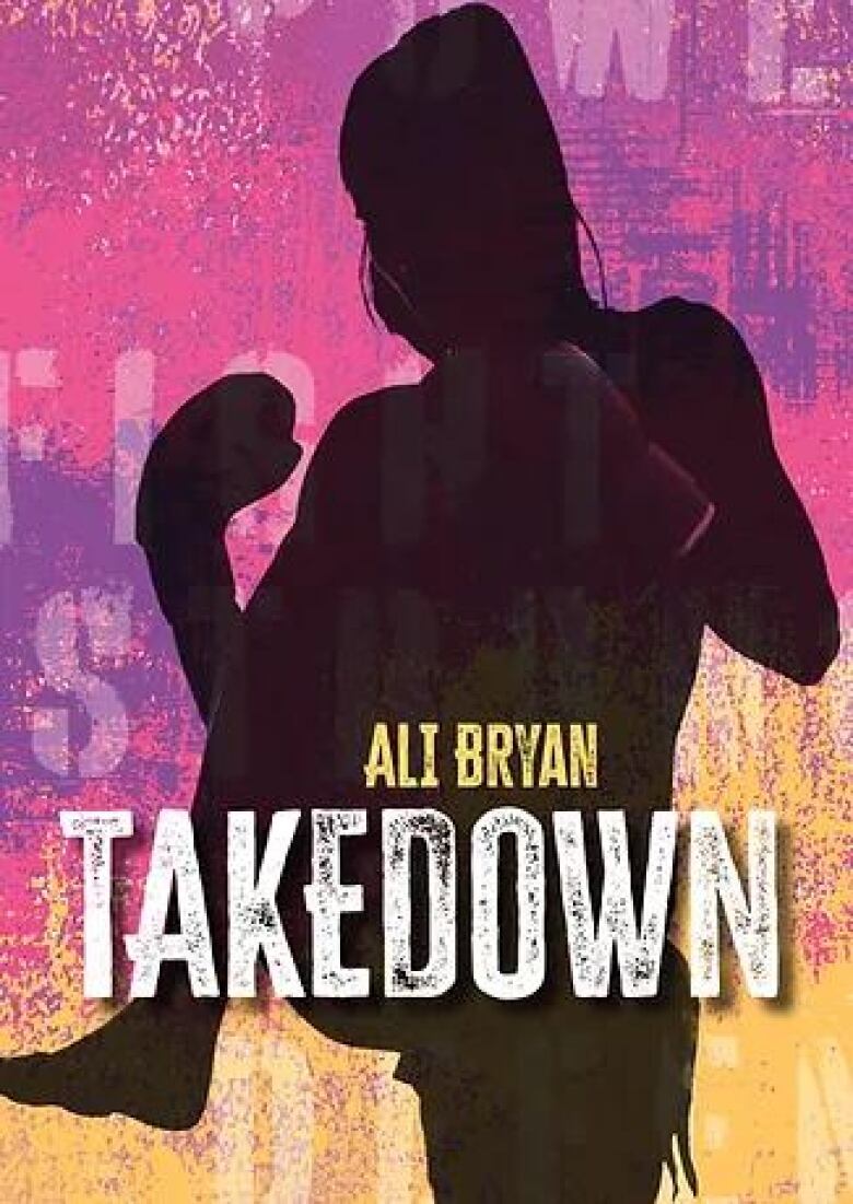 The book cover featuring a silhouette of a female wrestler.