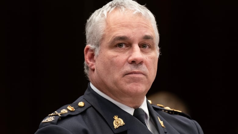 RCMP Commissioner Mike Duheme waits to appear before the House of Commons Access to Information, Privacy and Ethics committee, Tuesday, February 27, 2024 in Ottawa. 