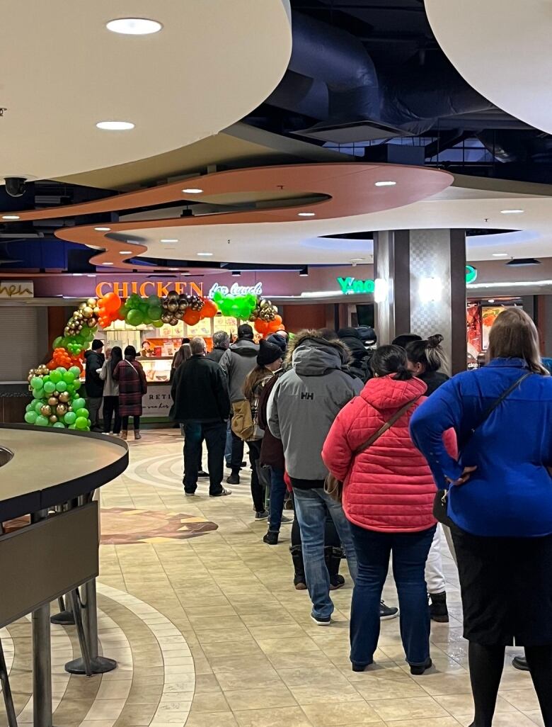 A long line is seen at the downtown restaurant Chicken for Lunch on its second-last day. 