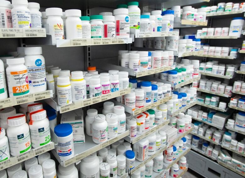 Prescription drugs are seen on shelves at a pharmacy in Montreal.