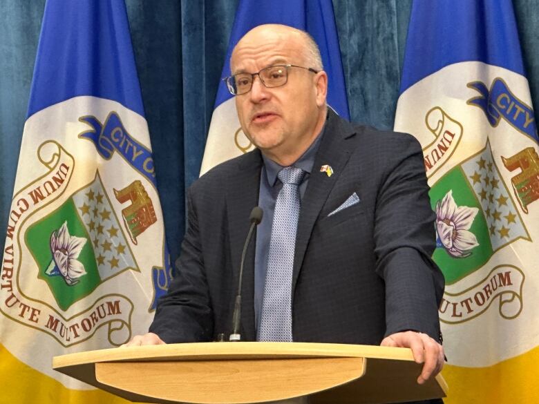 A man standing at a podium.