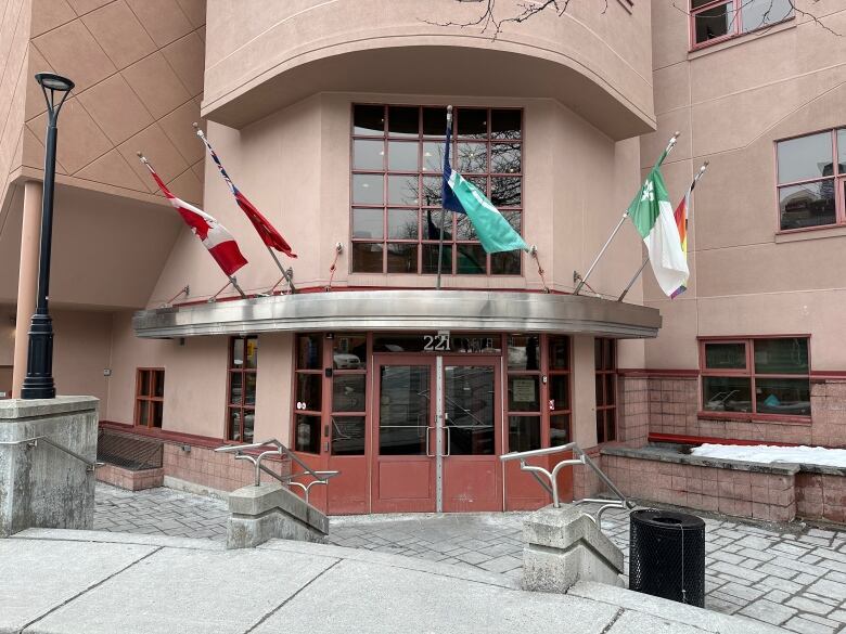 The entrance to a community health centre in a city in late winter.