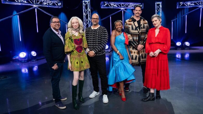 A portrait of the cast of Canada Reads 2024 in the television studio.