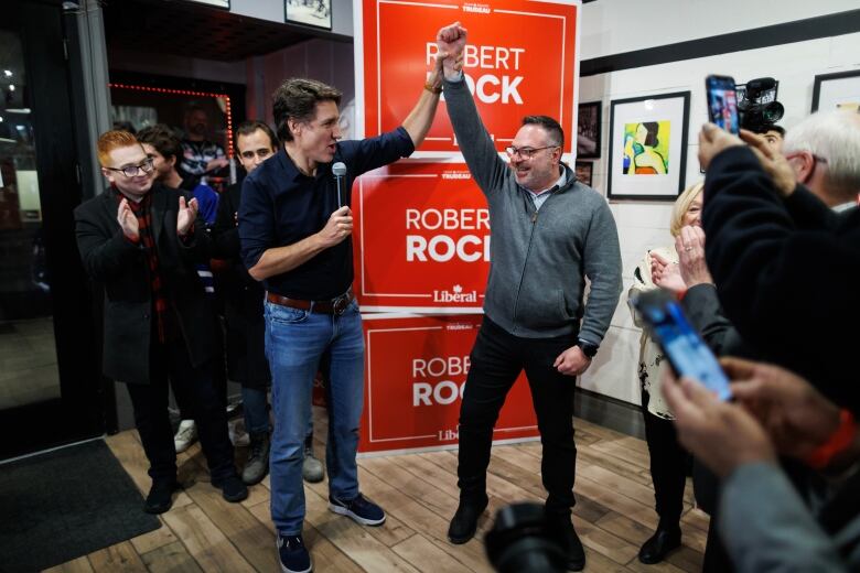 Prime Minister Justin Trudeau speaks at a campaign event for Liberal by-election candidate Robert Rock, right, in Durham riding, in Bowmanville, Ont. 