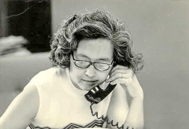 Gretta Grant works at her law desk in the 1970s.