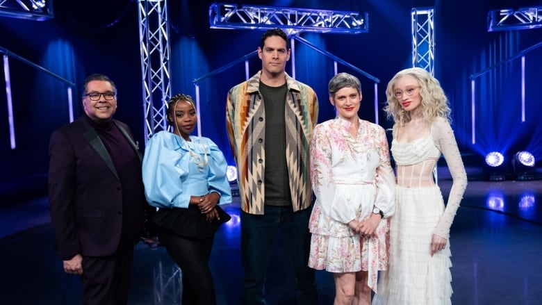 A portrait of the cast of Canada Reads 2024 in the television studio.