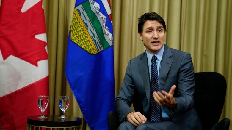 Prime Minister Justin Trudeau speaks as he meets with Alberta Premier Danielle Smith (not shown) in Calgary on Wednesday, March 13, 2024. 