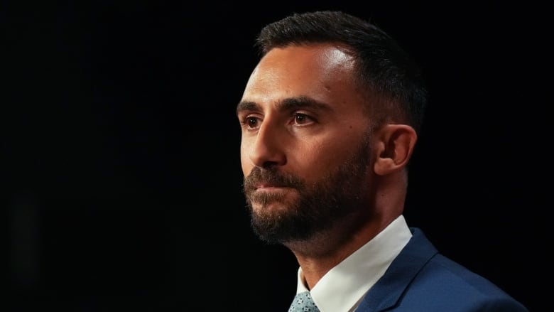 Ontario Education Minister Stephen Lecce speaks to journalists at Queen's Park in Toronto on Aug. 25, 2023.