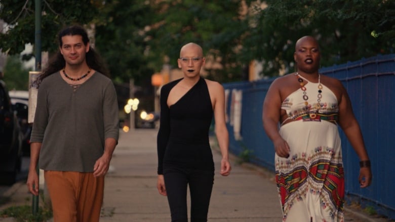 Scientists Daniel Pfau,  Simn(e) Sun, and Elle Lett are pictured walking outside.