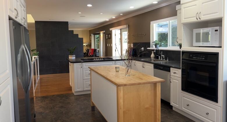 Inside of a kitchen in a home. 