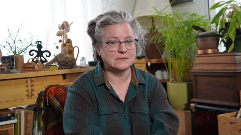 Portrait of a woman in her home.