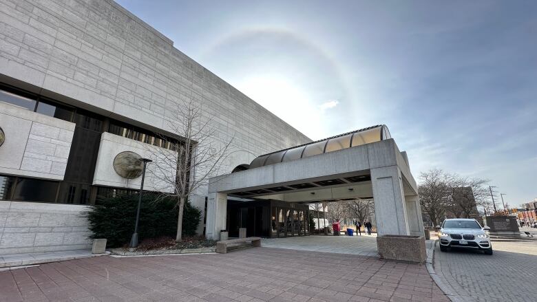 A city's courthouse on a sunny spring day.