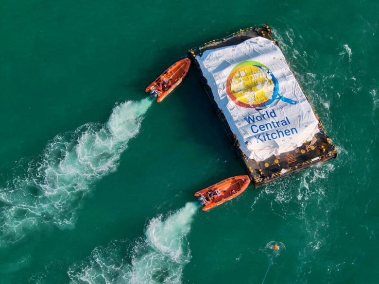 FILE PHOTO: World Central Kitchen (WCK) barge loaded with food arrives off the Gaza coast, where there is risk of famine after five months of Israel's military campaign, in this handout image released March 15, 2024.