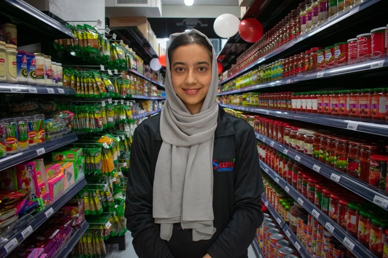 A woman smiling.